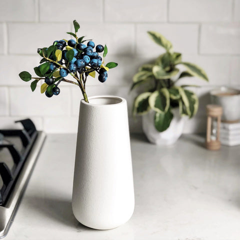 Artificial blueberries White ceramic vase